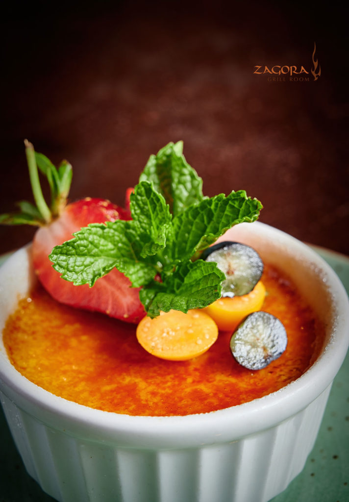 A Vanilla Creme Brulee with strawberry from the new Zagora Grill Room Menu